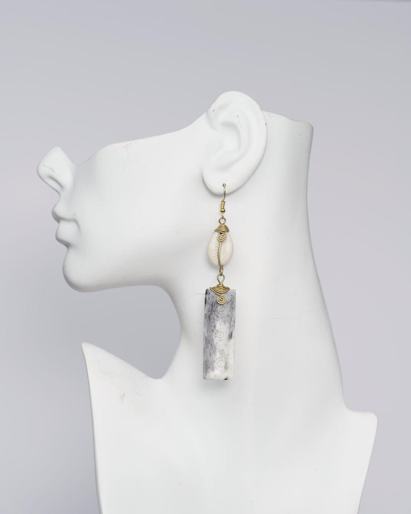 Monument with Cowry Earrings